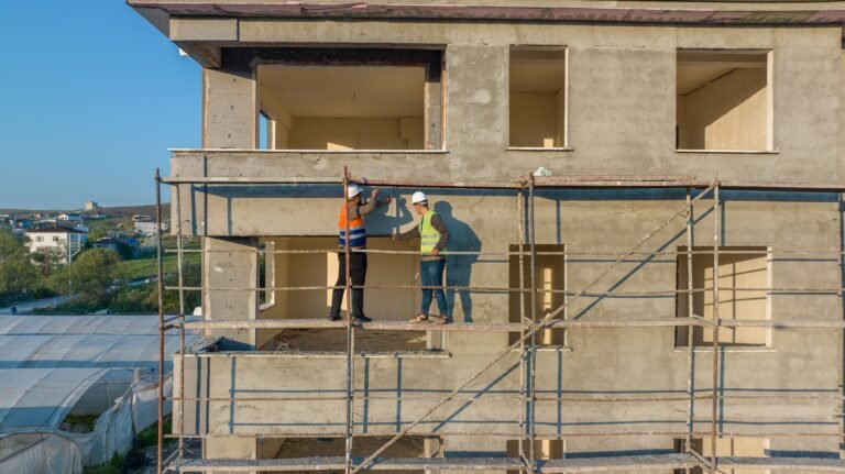 construction workers on a scaffolding